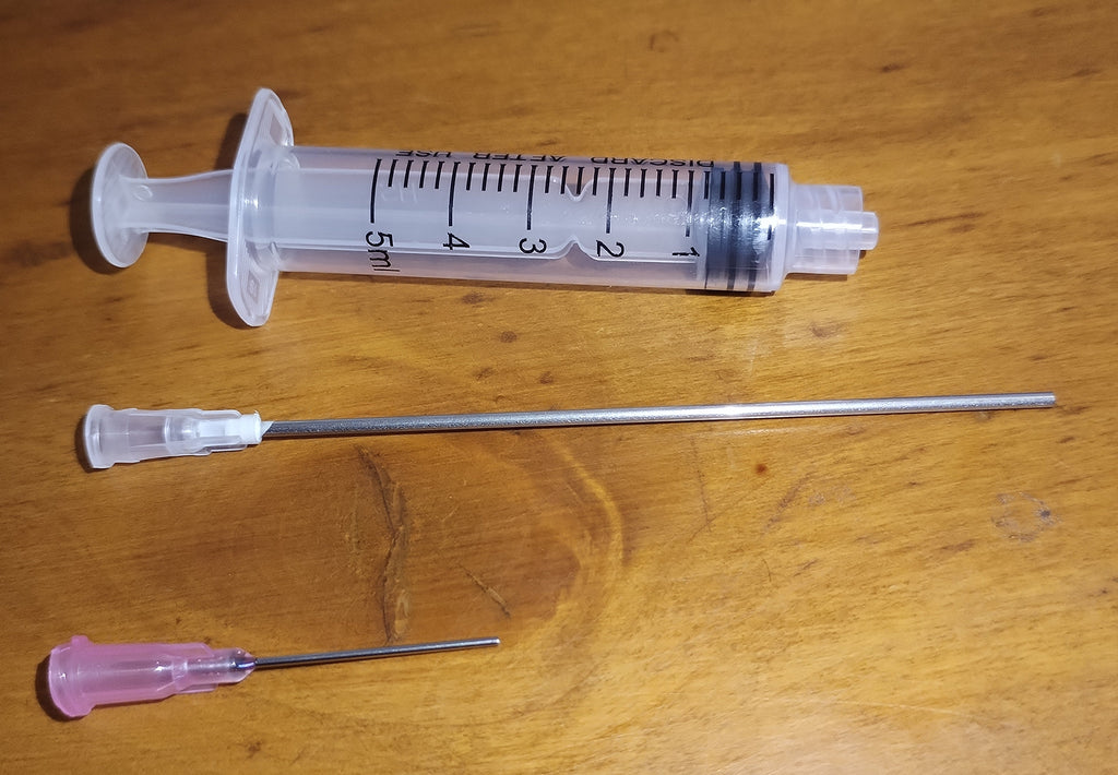 Seringue avec Aiguilles Anti-Piqûre